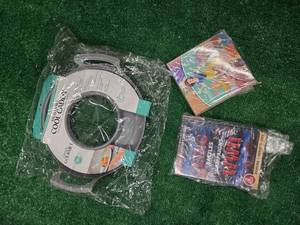 lot 102 image: Lot of 3 Items Microwave Cool Caddy, DVD, and Book(All are new)