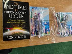 lot 104 image: Lot  of 3 items 2 Gift card packs, each containing 10 gift cards,10 envelopes and 6 pens and a Book ( The End Times in Chronological Order) New