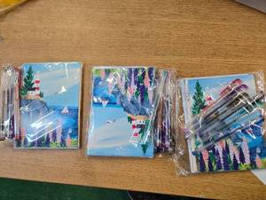 lot 105 image: Lot 3 Gift card packs, each containing 10 gift cards,10 envelopes and 6 pens(All are new)