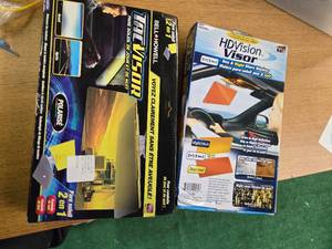 lot 106 image: Lot of 2 items Bell  Howell TacVisor and HD Vision Visor(All are new)