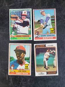 lot 60 image: Four Vintage Topps Cards Brooks Robinson, Gary Carter, Jim Rice, Jim Palmer