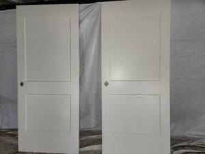 lot 12 image: 6- 2panel solid core white doors
