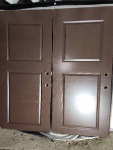 lot 13 image: 4- 2panel solid core chocolate doors