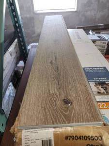 lot 61 image: 8 boxes aged hickory pro cali vinyl flooring