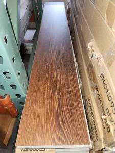 lot 72 image: 2 boxes cali vinyl saddlewood classic vinyl flooring