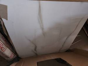 lot 75 image: 3 boxes 24x24 aria Blanco polished porcelain tile