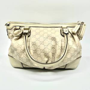 lot 23A image: Gucci GG Beige Guccissima Leather Handbag $1,500 Used Retail