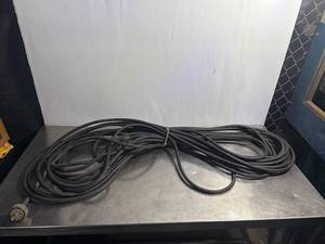 lot 21 image: Heavy-duty 123 Rubber Power Cord with Plug Durable 30 ft Industrial Cable