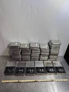 lot 84 image: Bulk Lot of 50 Digital Carabiner Compasses in Metal Cases