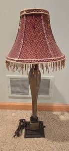 lot 25 image: 31 Table Lamp With Red Lamp Shade