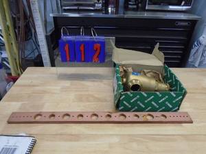 Qty of 6 copper straps  1 Caleffi 55041A. As shown.