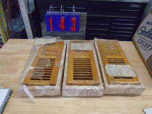 Qty of 3 12 x 4 oak vent covers. As shown.