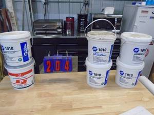 6 pails of duct sealant. As shown.
