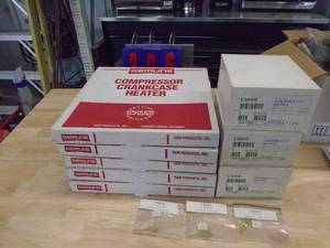 Compressor heaters & thermostat guards with keys. As shown.