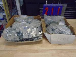 Box of pipe straps. As shown.