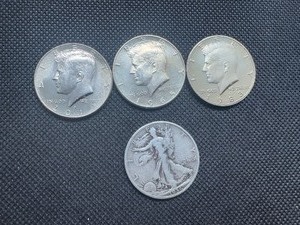 Four Half Dollars, 1936 VF Walker, 1983S Gem Proof from Set, 1965 MS Uncirculated and 2019 Uncirculated from Fed Roll