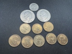 Eleven Asst Clad Dollars, (2) Ikes, (3) Sacs, (1) SBA, (5) Presidents