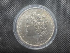 1881O AU Morgan Dollar, Intact Cheek & Rims, Trace Bag Marks in the Fields, Poss MS