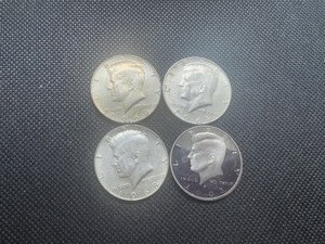 Four 40% and Proof Kennedy Half Dollars, (3) 1968S & 2005S Clad
