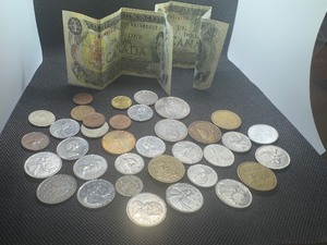 Thirty-Seven International Coins & Currency, (35) Coins and (2) $1 Canadian