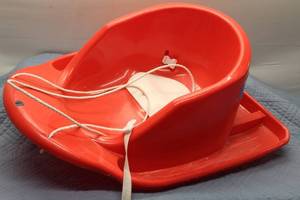 lot 6 image: Used Red Sled with Safety Straps