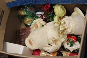 lot 70 image: Mixed Holiday Decor Lot Including Santa Figures, Dishes, and Decorative Eggs