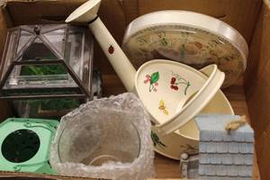 lot 72 image: Assorted Decorative Items including Watering Can, Clock, and Greenhouse