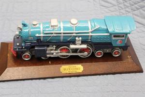 lot A-76 image: Collectible Blue Comet Model Train on Display Base