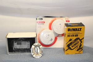 lot 108 image: Lot of 2 Dewalt Battery Charger and Magellan GPS Navigator