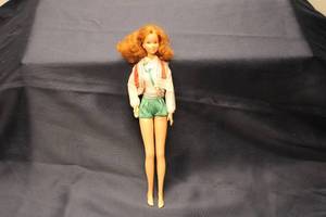 lot 124 image: 1979 Phillips Barbie Doll with Curly Red Hair