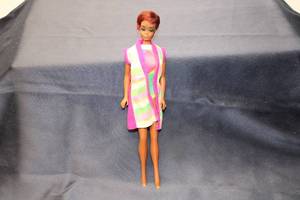 lot 126 image: Vintage Barbie Doll with Colorful Swimsuit and Cover-Up