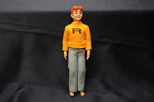 lot 138 image: Vintage Archie Doll with Orange Sweater and Jeans