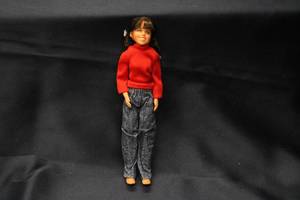 lot 139 image: Vintage Doll wearing Red Sweater and Denim Jeans
