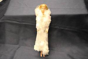 lot 144 image: Vintage 1966 Barbie Doll in Elegant White Gown with Iridescent Ribbons