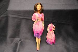 lot 146 image: Vintage Barbie Doll with Pink and Purple Dress and Accessories