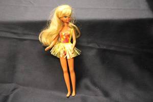 lot 149 image: Vintage Doll with Blonde Hair and Colorful Outfit