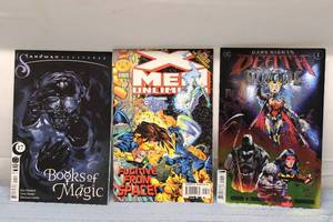 lot 220 image: Collection of 36 Vintage Comics Including Sandman, X-Men, and Justice League