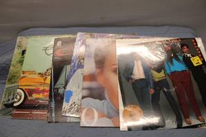 lot 236 image: Collection of 8 Vintage Vinyl Records Including Elvis and Olivia Newton-John