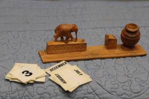 lot 258 image: Vintage Hand-Carved Wooden Elephant Desk Calendar with Stand