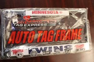 lot 282 image: Minnesota Twins NASCAR Auto Tag Frame - New in Packaging