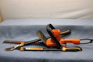 lot B-307 image: Black & Decker 18 Electric Hedge Trimmer with Fiskars Pruning Shears