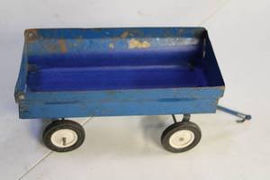 lot 24 image: Vintage Metal Toy Wagon with Blue Finish