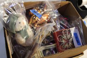 lot 43 image: Mixed Holiday Decorations Lot Including Snowman, Ornaments, and Cookie Cutters