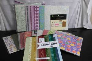 lot 127 image: Lot of 5 Scrapbook and Paper Packs with Various Designs (60 Sheets Each)