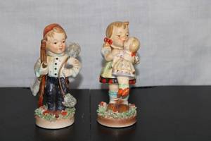 lot 380 image: Set of 2 Vintage Hummel Figurines - Chimney Sweeper & Girl Holding Doll