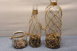 lot 403 image: Set of 3 Decorative Glass Bottles and Jars with Natural Pebbles