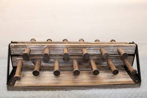 lot 404 image: Vintage Wooden Display Rack with 12 Pegs and Black Metal Support