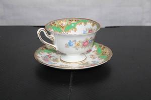 lot 467 image: Vintage Shelley Bone China Teacup and Saucer Set with Floral Design