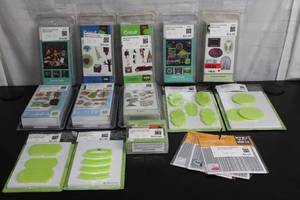 lot 469 image: Lot of 8 New Cricut Cartridges with Various Themes and Accessories