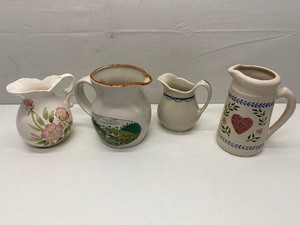 lot 308 image: Set of 4 Decorative Stoneware Pitchers with Differing Designs